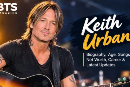 Keith Urban performing live on stage with guitar